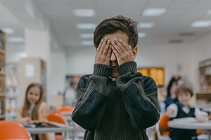 child of color being bullied